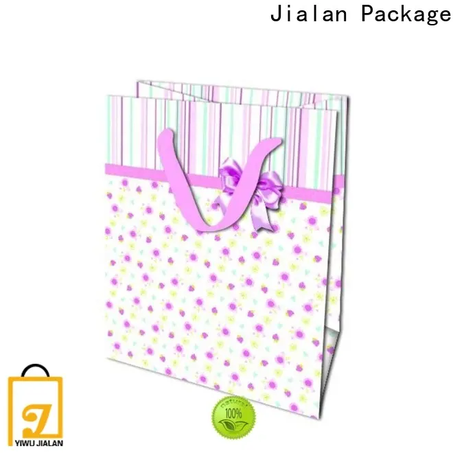 Comprar bolsas de papel de oro rosa a la venta para empacar regalos. 1