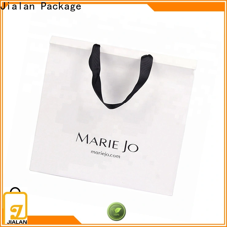 Jialan Paquete de bolsas de papel personalizadas con proveedor de asas para embalaje de mercancías. 1