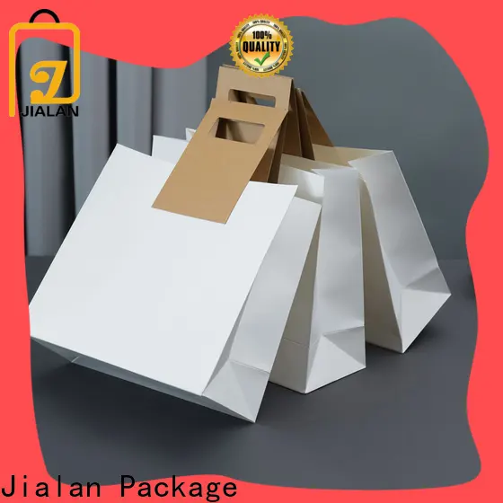 Bulk kraft paper carry bags supplier for shopping in supermarkets 1