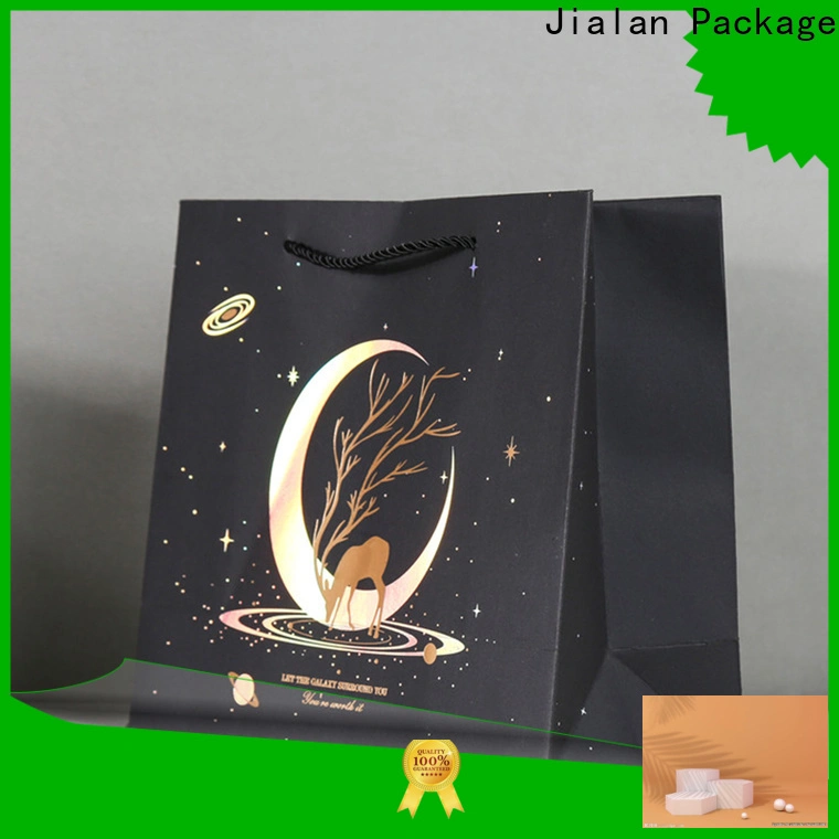 Nueva empresa de bolsas de regalo de papel para embalaje de regalos navideños. 1