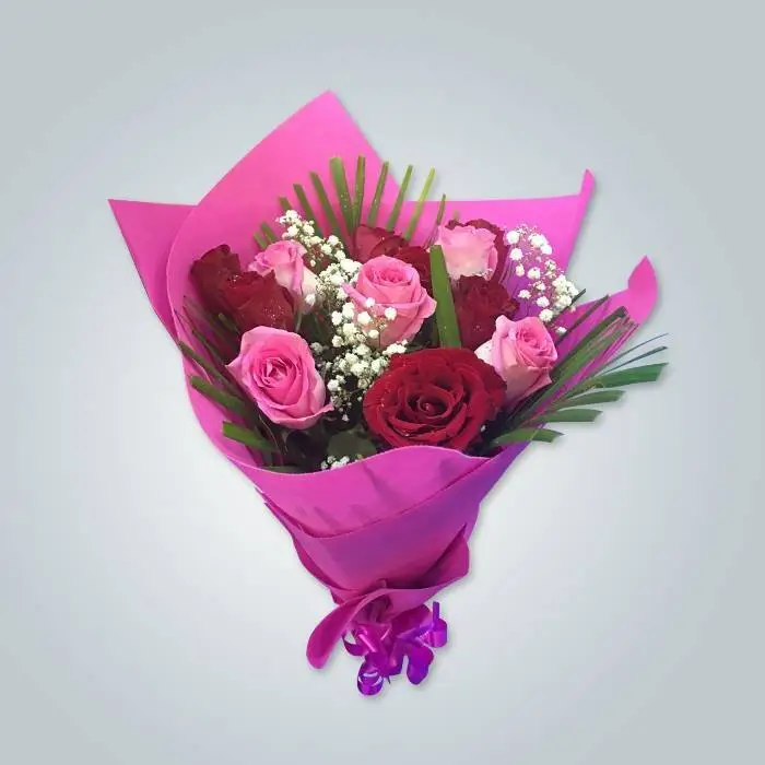 Fornecedor de papel de embrulho de flores não tecido colorido OEM 1