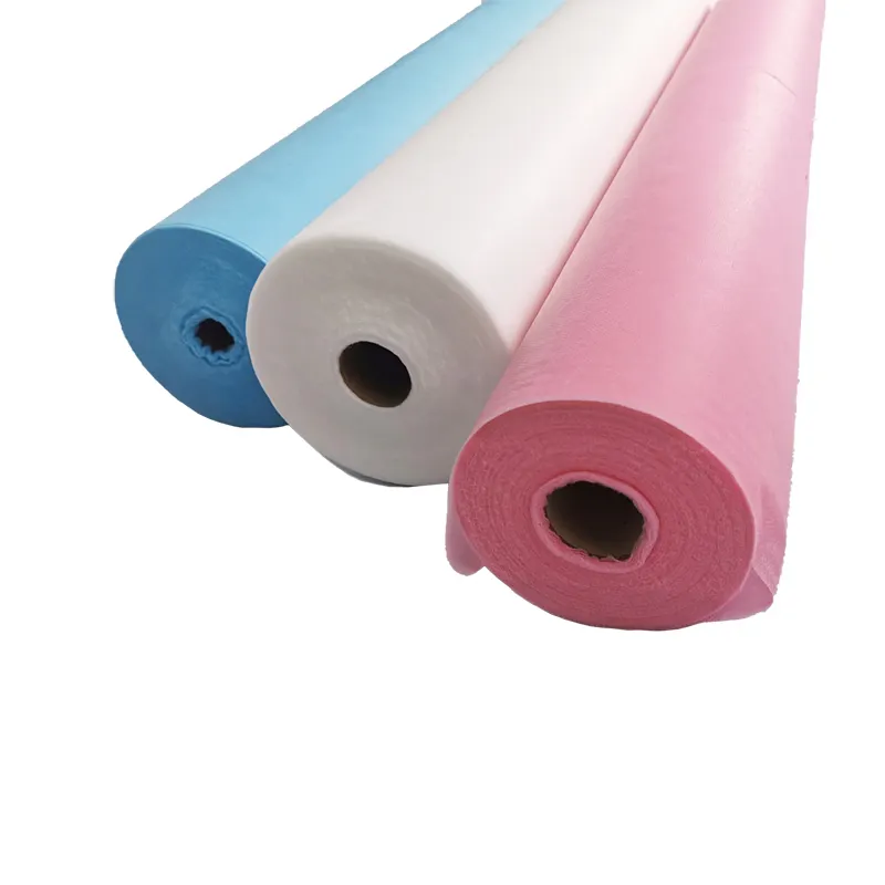 White non woven disposable massage table sheets roll with pre-cut face opening perforated 25gsm 1