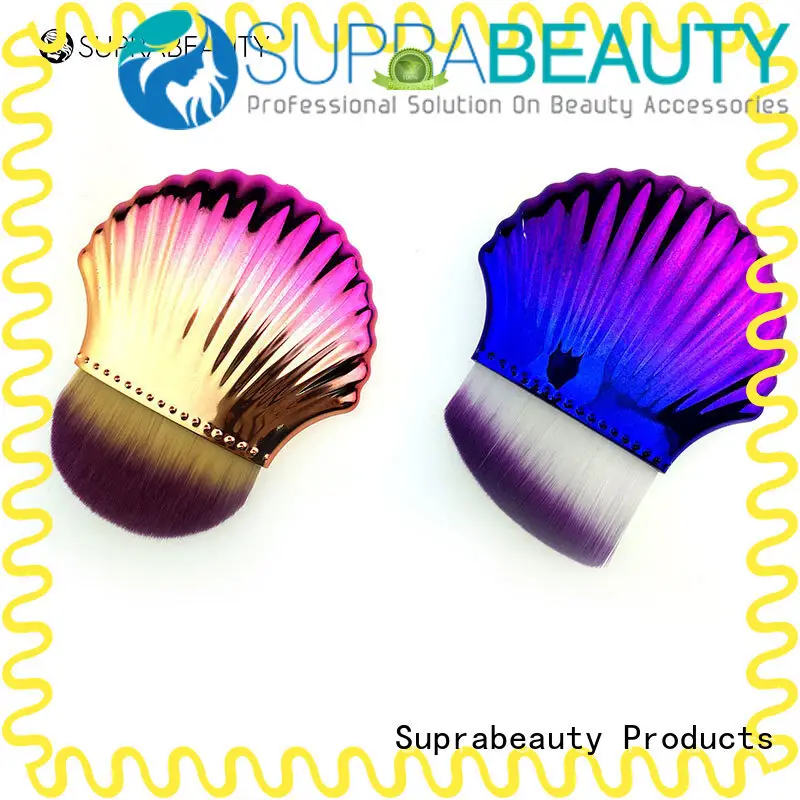 ルースパウダー用のメイクアップブラシをスピンします。 Suprabeauty 1