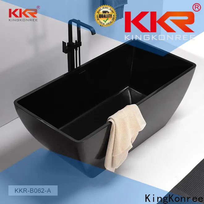KingKonree marble solid surface freestanding tub at discount for hotel 1