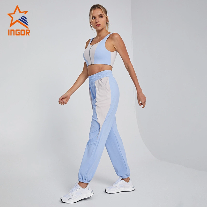 Abbigliamento fitness personalizzato Ingorsports Reggiseno sportivo con scollo profondo a U sul retro con nastro riflettente Colore a contrasto & Set di pantaloni da jogging dal taglio ampio con due tasche laterali 1