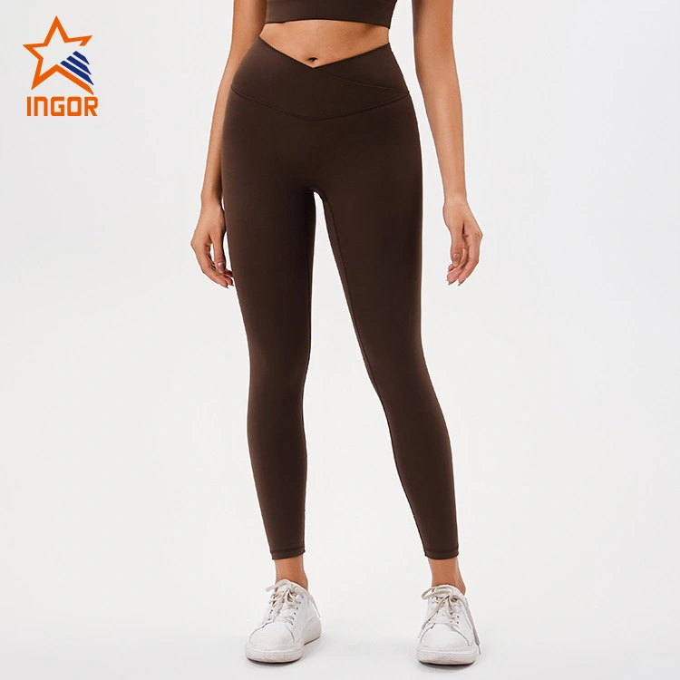 Lieferanten von Fitnessbekleidung, maßgeschneiderte Damen-Yoga-Leggings aus recyceltem Stoff mit überkreuzter Taille 1