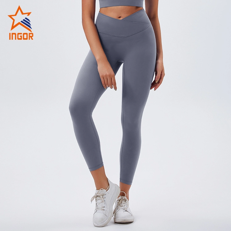 Fornitore di vestiti da allenamento Leggings da yoga stretti in vita incrociata da donna in tessuto riciclato personalizzato 1