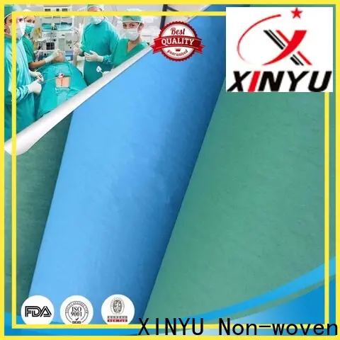 XINYU Non-woven non woven fabric uses factory for non-medical isolation gown 1