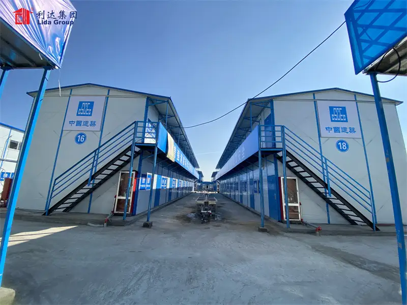 ​​Heavy-Duty Expandable Mining Workshop Kit - 100x50m Prefabricated Steel Structure Building for Rapid Site Constructions​ 1