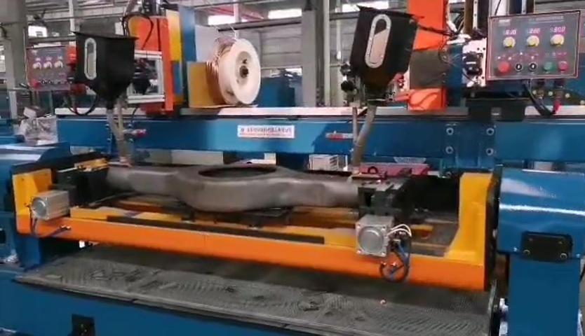 Automotive drive axle shell longitudinal seam submerged arc welding machine