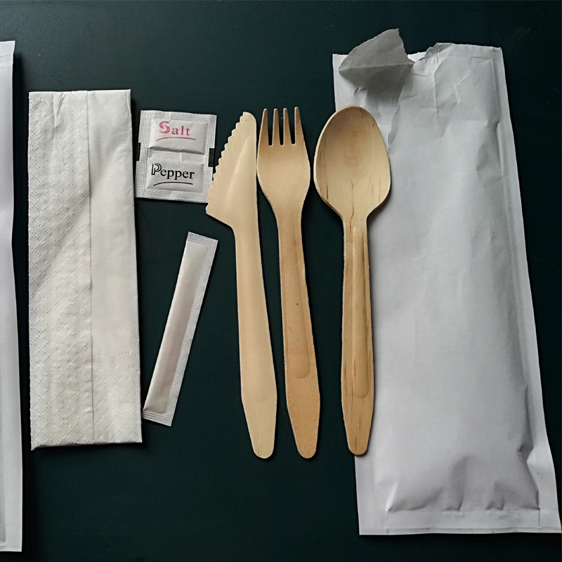 Four-side sealing tableware packaging machine