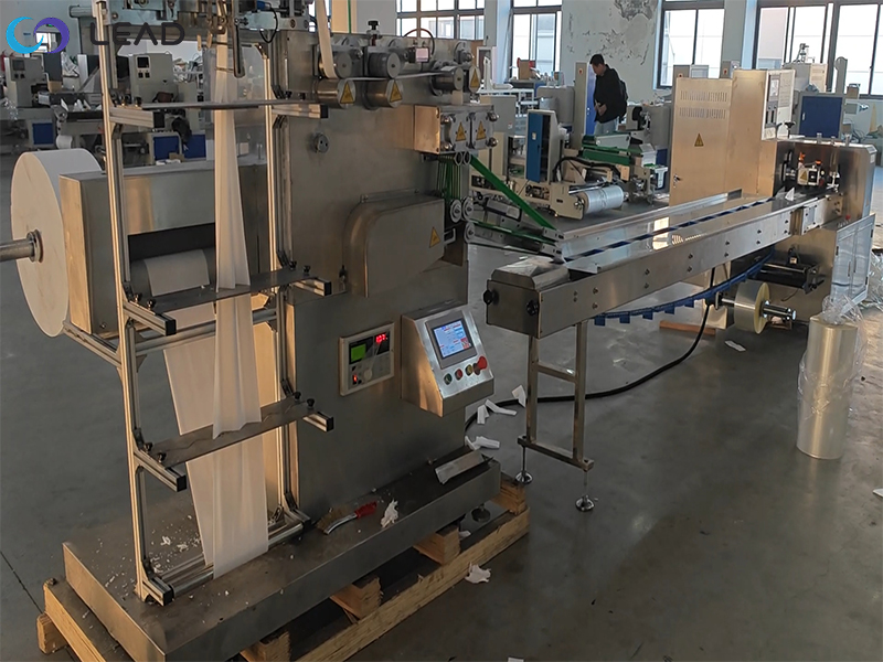 Single piece napkin automatic folding printing and packaging machine