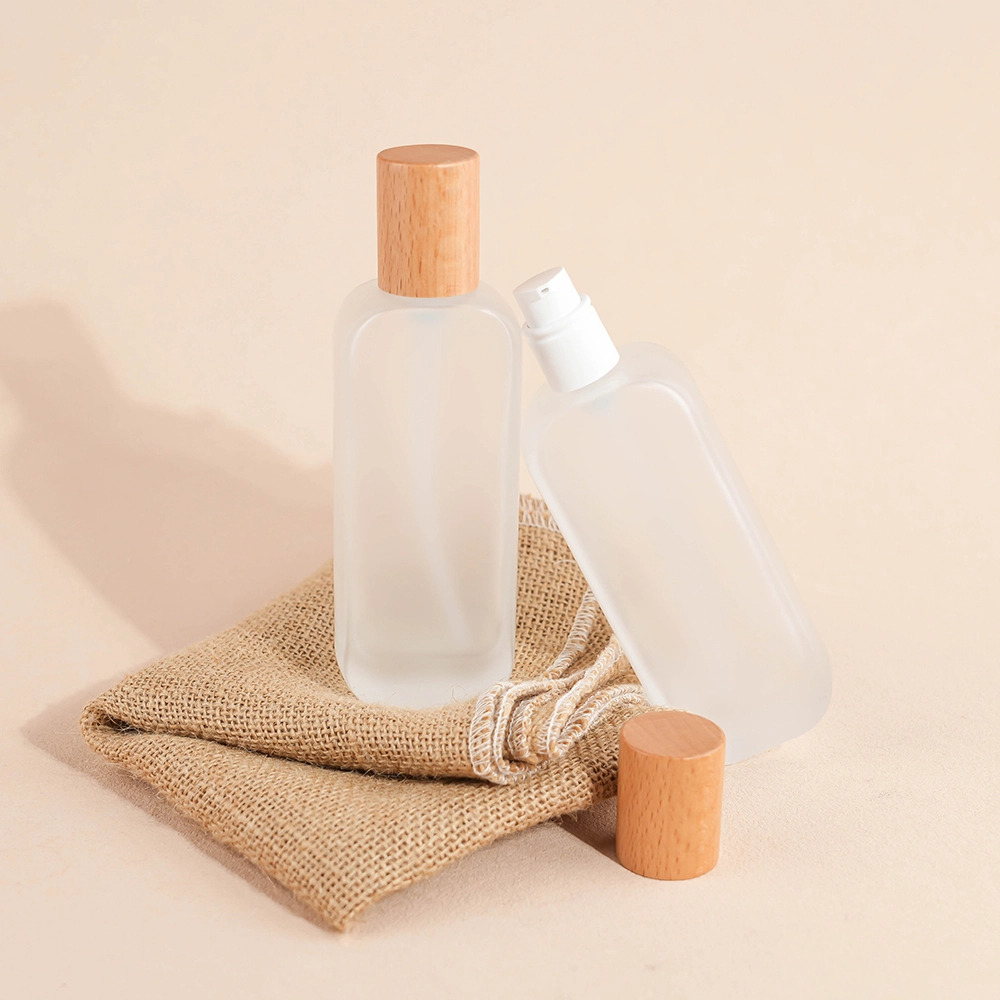 100ml Glass Cylinder Lotion Pump Bottle with Wood Cap | Screen Printed Cosmetic Packaging for Cream, Serum BEST-B23201 1