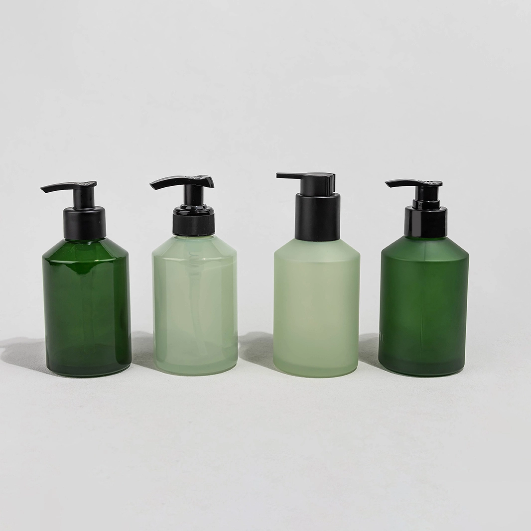 Фирменная стеклянная бутылка объемом 200 мл со скошенными плечиками и дозатором для лосьона – пустая косметическая упаковка для средств по уходу за кожей лица и тела BEST-311462 1