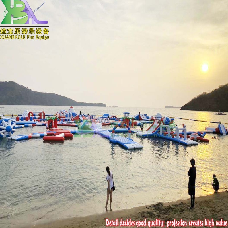 Parque acuático inflable al aire libre con isla para resort vacacional, parque acuático de playa con obstáculos flotantes 5