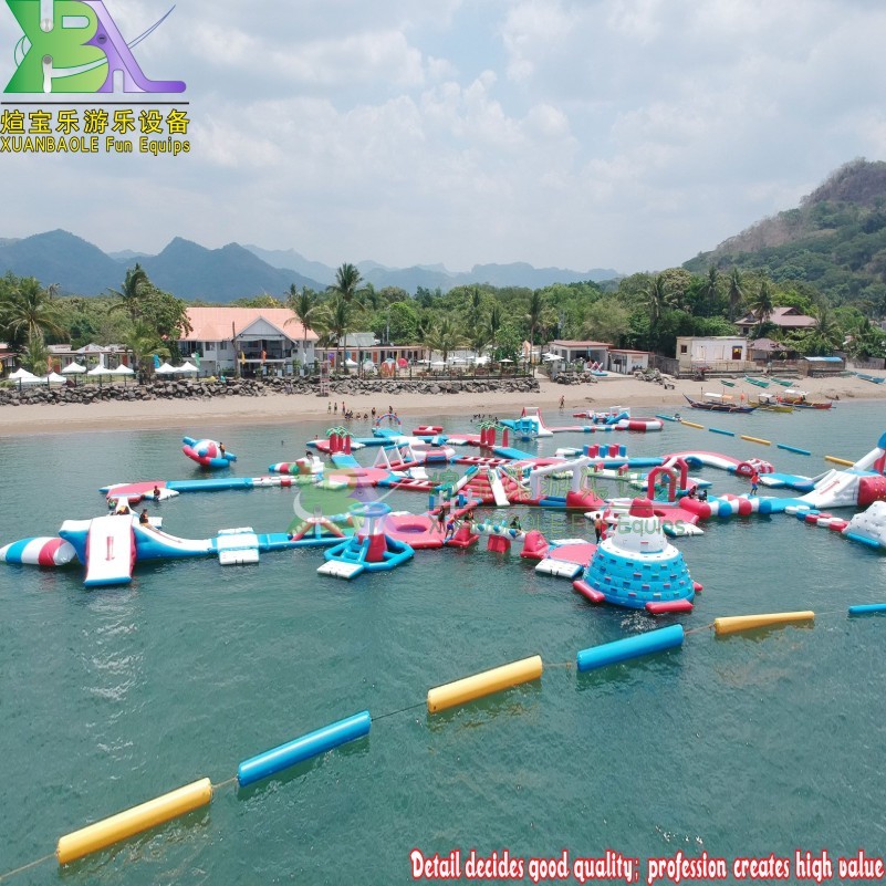 Parque acuático inflable al aire libre con isla para resort vacacional, parque acuático de playa con obstáculos flotantes 9