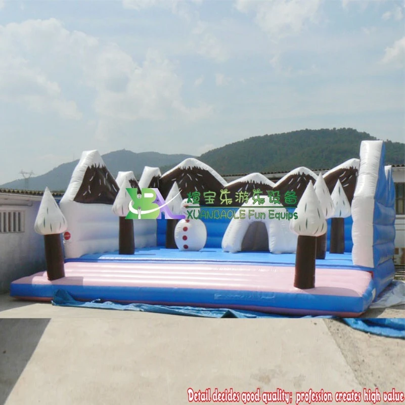 Castillo inflable para saltar con nieve invernal y trampolín inflable 1