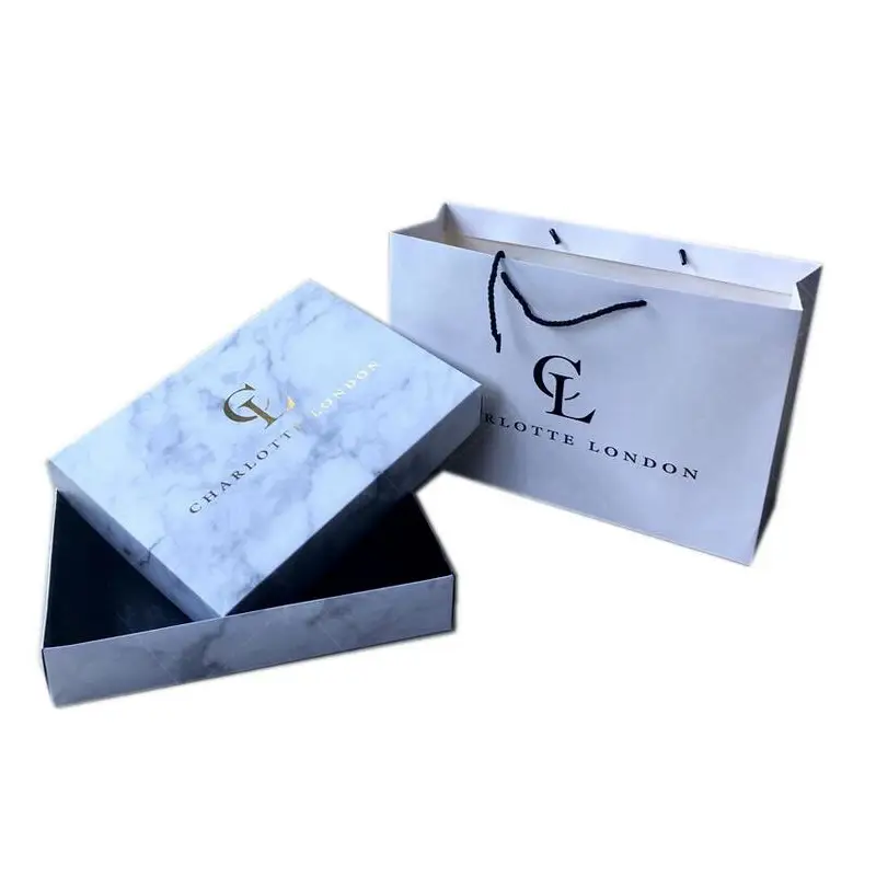Custom Wholesale Printed Luxury Paper Shopping Clothing Packaging Bag With Logo 1