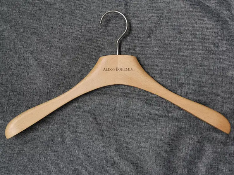 Beech wooden hanger in natural color with customized laser logo 1