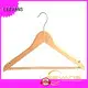 Wholesale coloured wooden coat hangers home for business for children 1