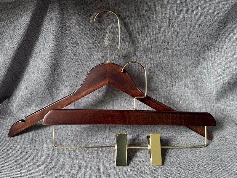 Custom dark brown wooden hanger with gold hook and clips 1