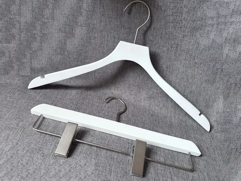 High Smooth matt white wooden hanger with metal clips 1