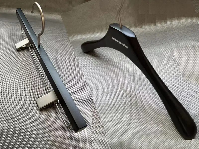 All black luxury wooden hanger with white brand logo 1