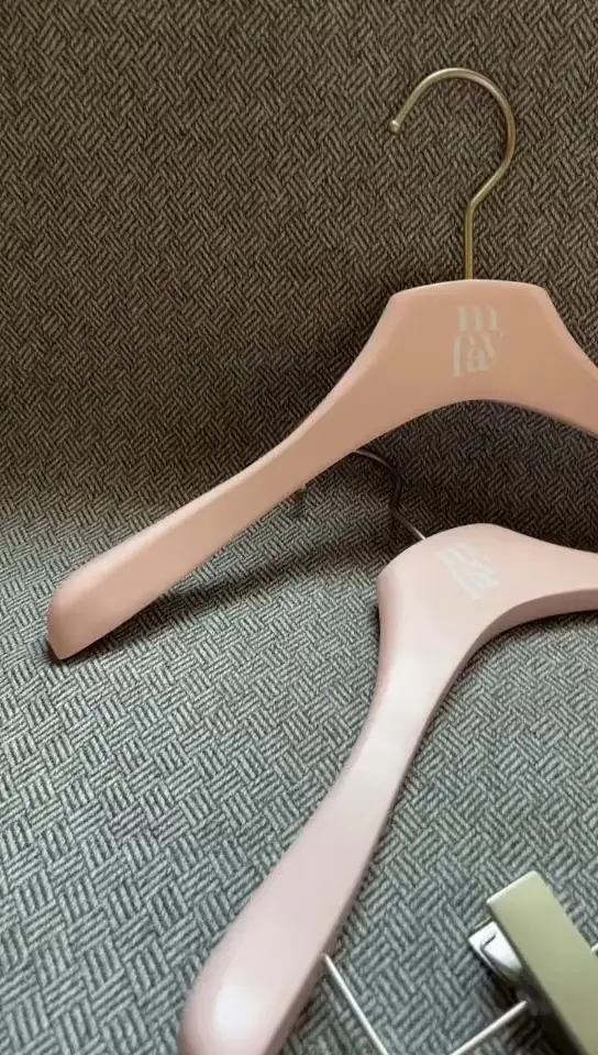Customized pink color and brand logo for wooden hanger 1