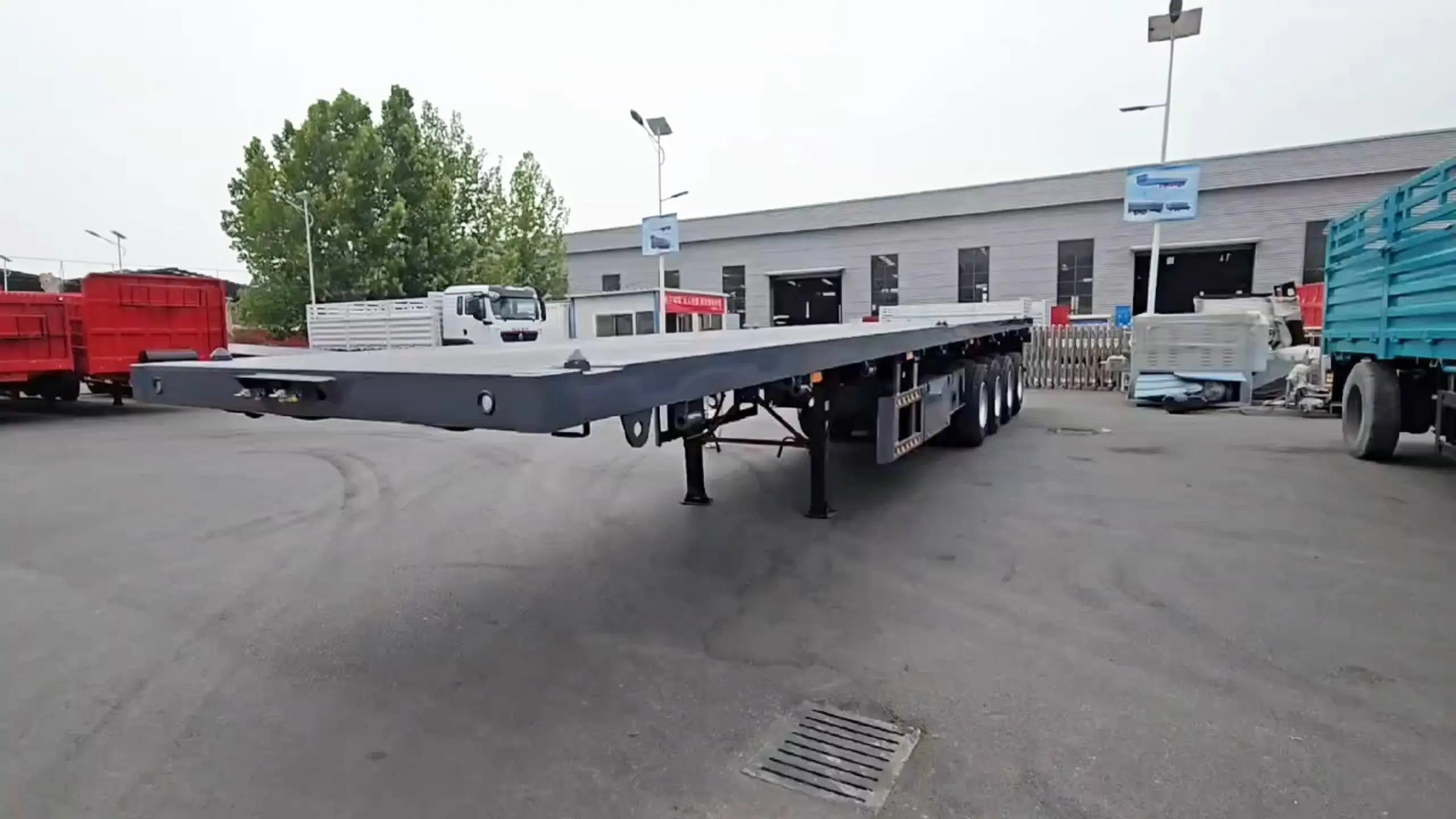 Heavy Duty 4 Axle Flatbed Semi Trailer 1