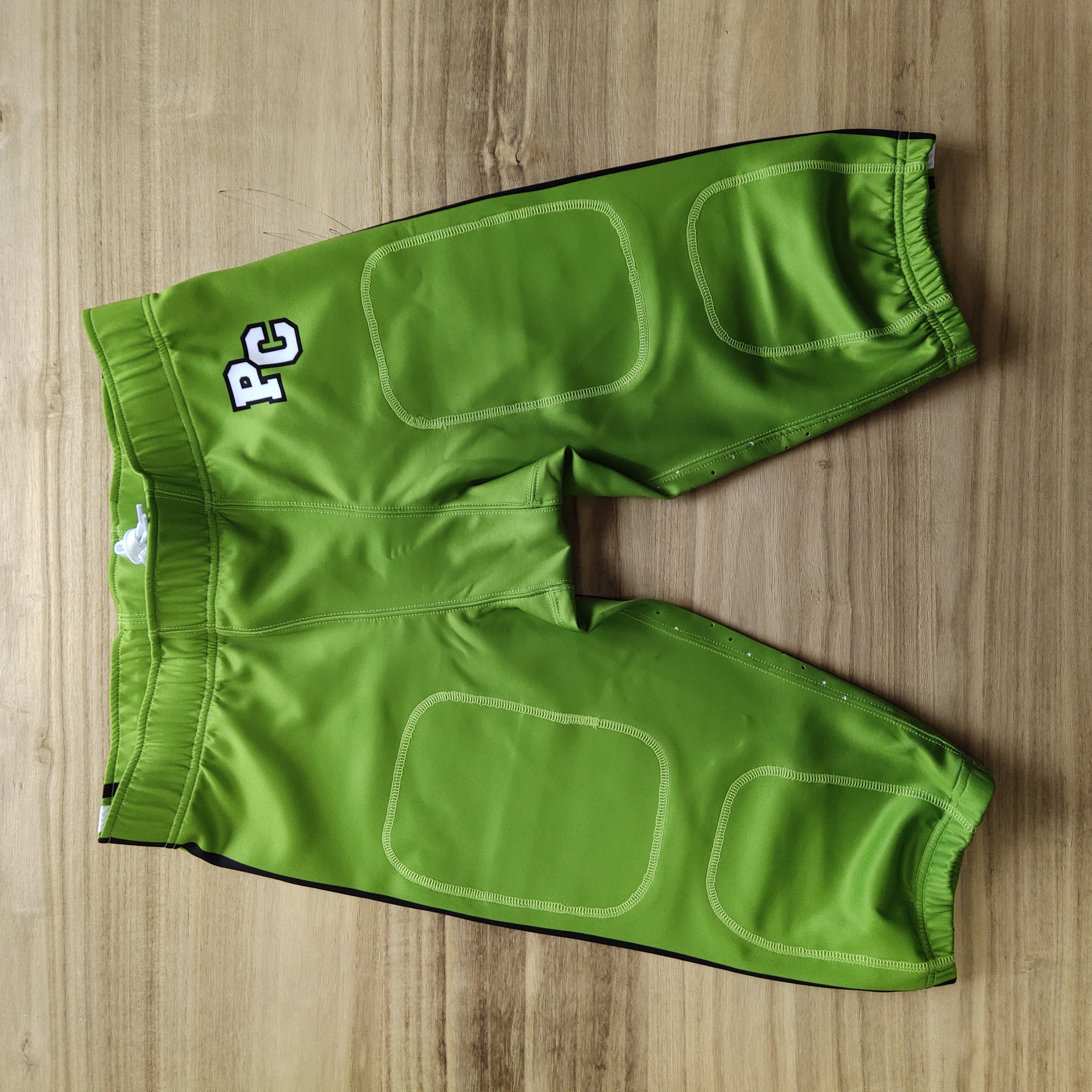 Pantalones de fútbol americano con cordones personalizados 1
