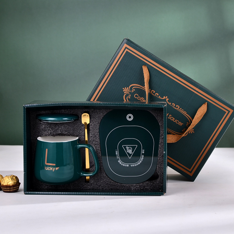 Smeraldaj ceramikaj kafaj tasoj reuzeblaj luksaj porcelanaj tasoj Fabrikisto Donaca Skatolo kun hejtilo 220V Propra Logo 3