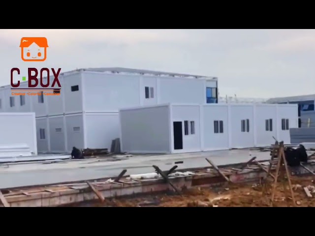 منزل حاويات مدهشين من طابقين مع جدار ستارة من Cbox
