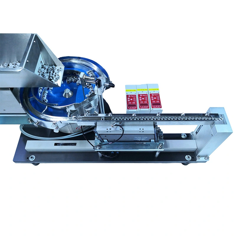 Automatic parts feeding system with parts escapement mechanism for plastic caps in pharmaceutical industry Model TUV-S03 1
