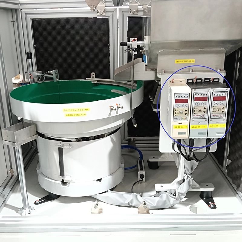 Vibration bowl feeder for rubber plugs with part nest escapement side shuttle mechanism for automotive customized parts feeding system TUV-S13 1