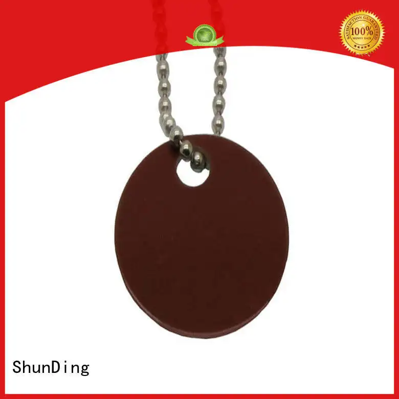 metal dog tags domed embossed pattern key tag manufacture 1