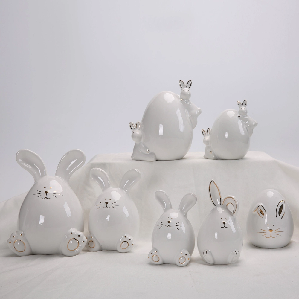 Figuras de conejo de Pascua con huevos para decorar el escritorio del hogar. 1