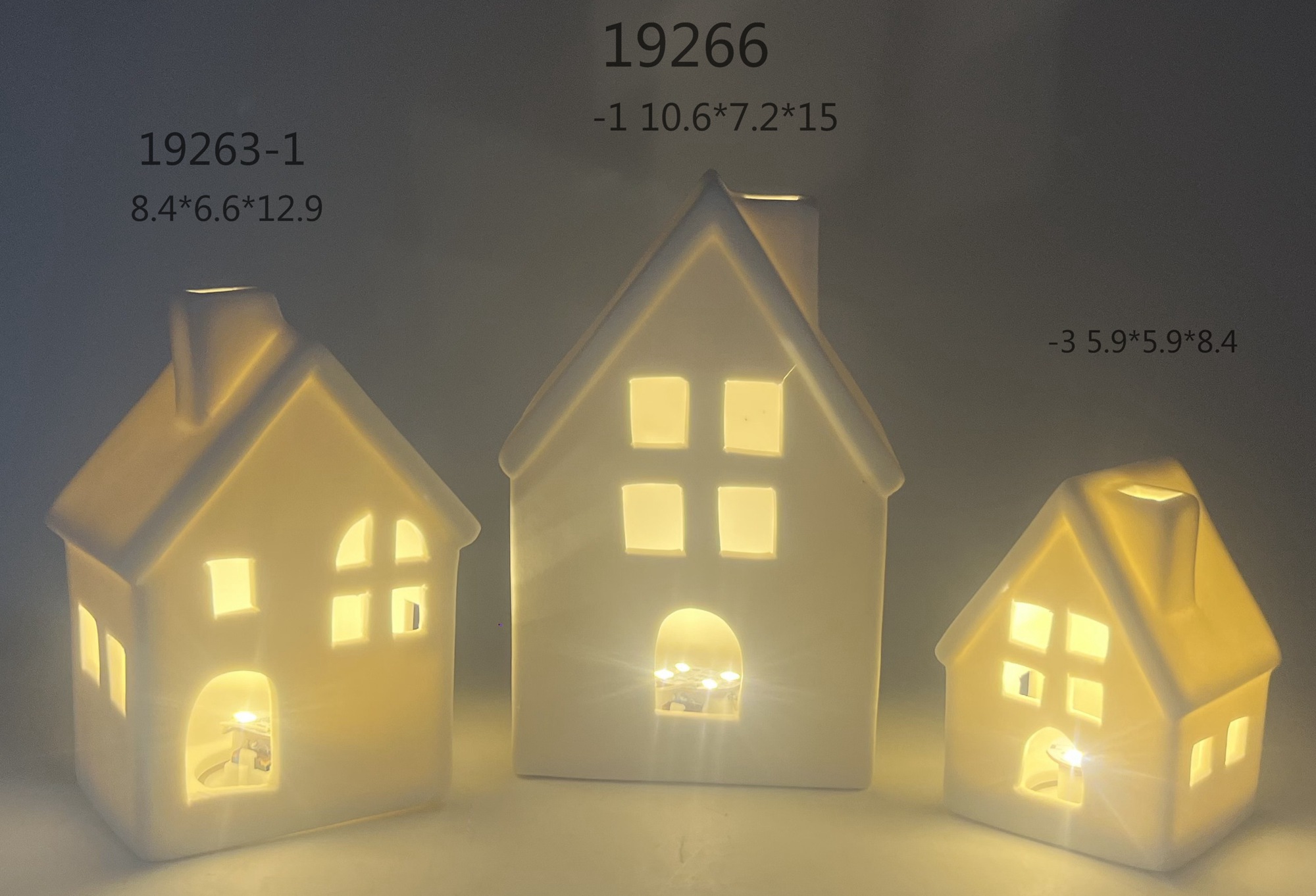 Weißes Porzellan Weihnachten LED beleuchtete weiße Häuser Dekor Miniatur Weihnachten Dorf Häuser Schneeflocke weiß leuchtende Schloss 3
