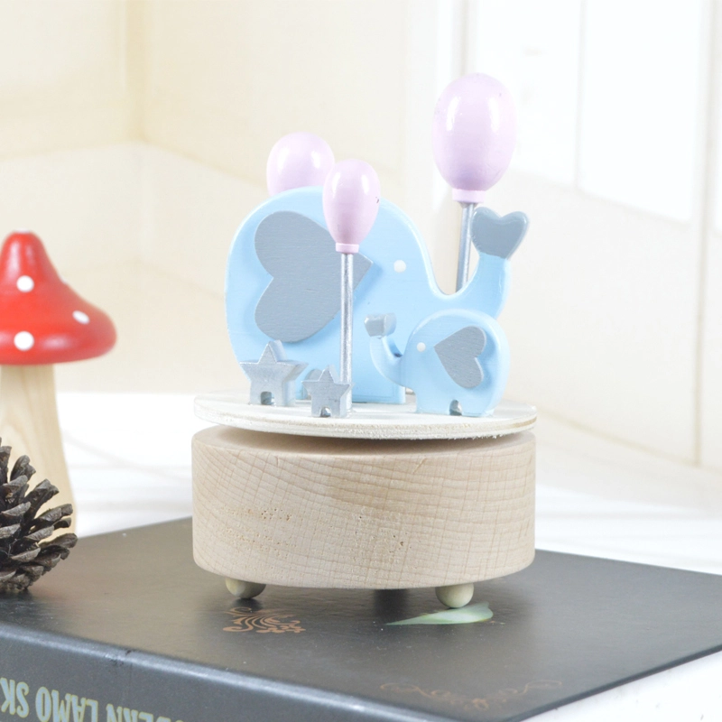Handmade wooden happy elephant rotating music box 1