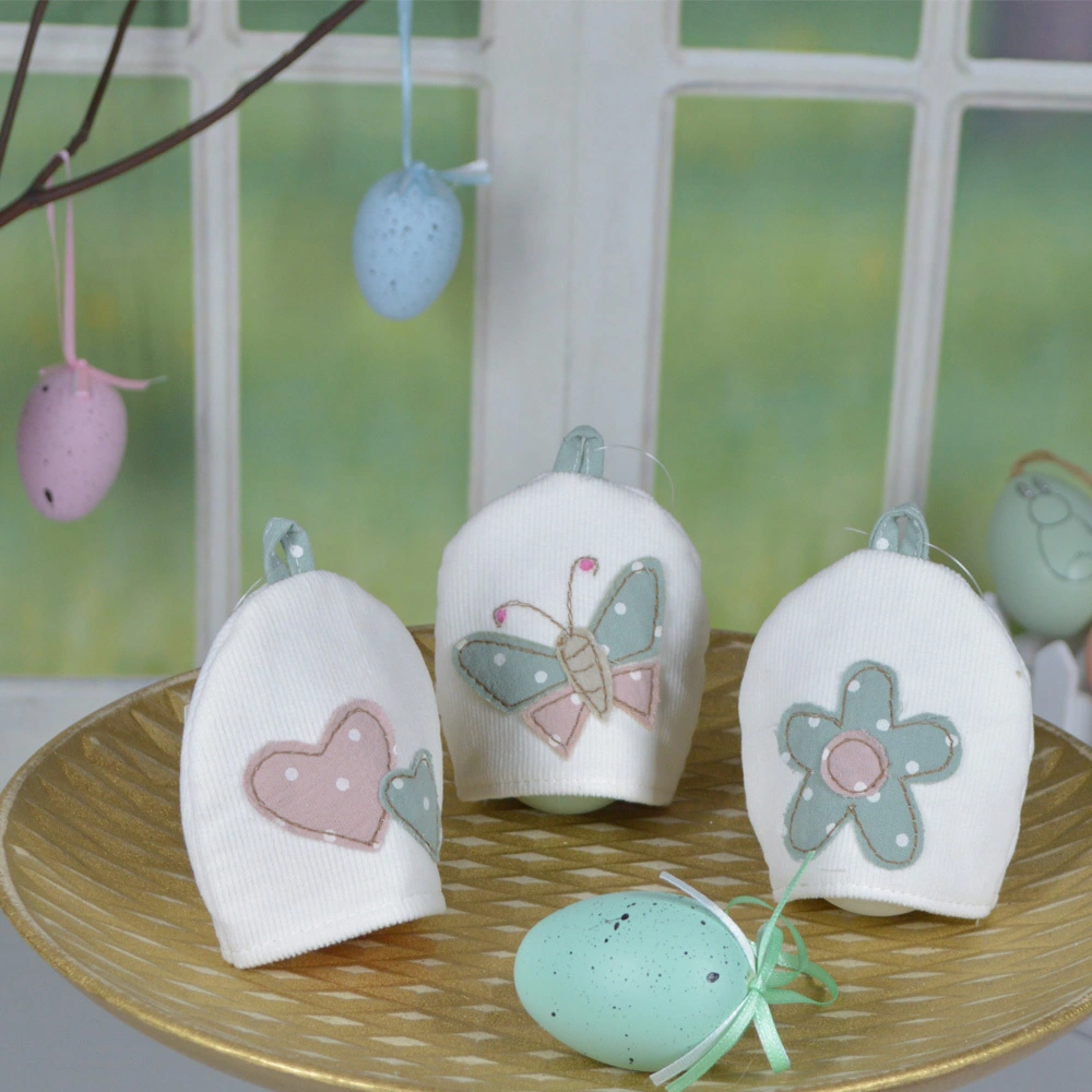 Venta al por mayor, promocional, funda para huevos de Pascua, de algodón, con forma de conejito y decoración de punto blanco, calentador/soporte para huevos 1