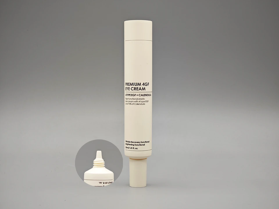 Tubo de creme para os olhos bege fosco com estampa offset e tampa giratória, design minimalista 1