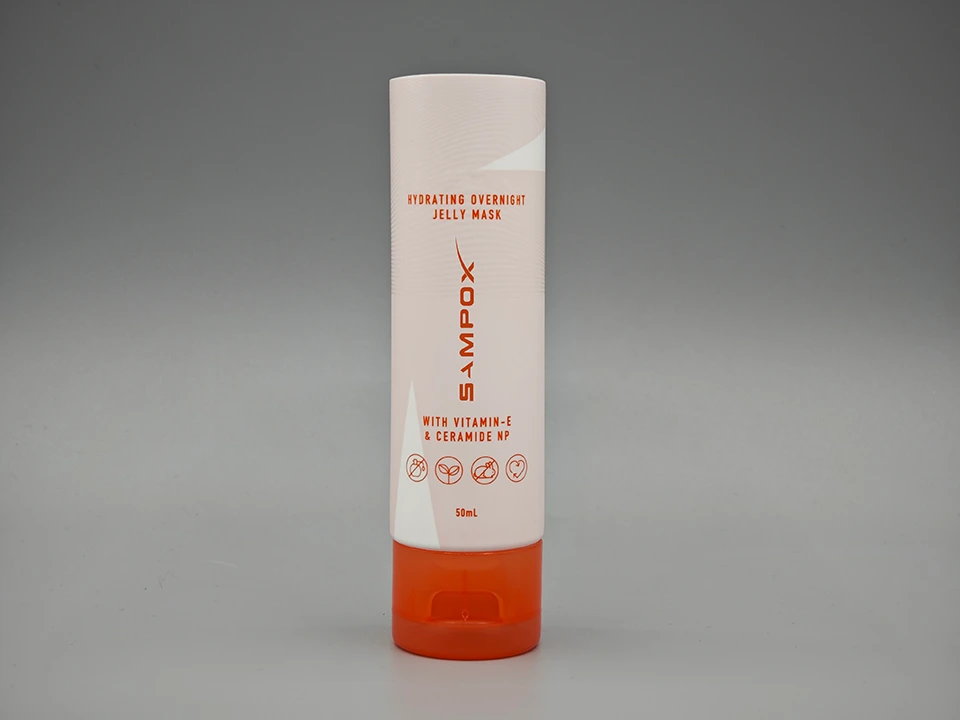 Pink Textured Mask Tube Orange Flip Cap Round Skincare Packaging 1