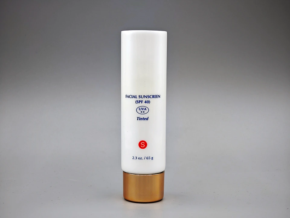 Custom Sunscreen Tube Face Packaging Tube 65g D35mm PE Gold Spiral Cap 1