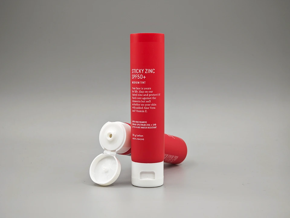 Custom Sunscreen Tube 50g D30mm PE Matte Red White Print Flip‑Top Cap 1