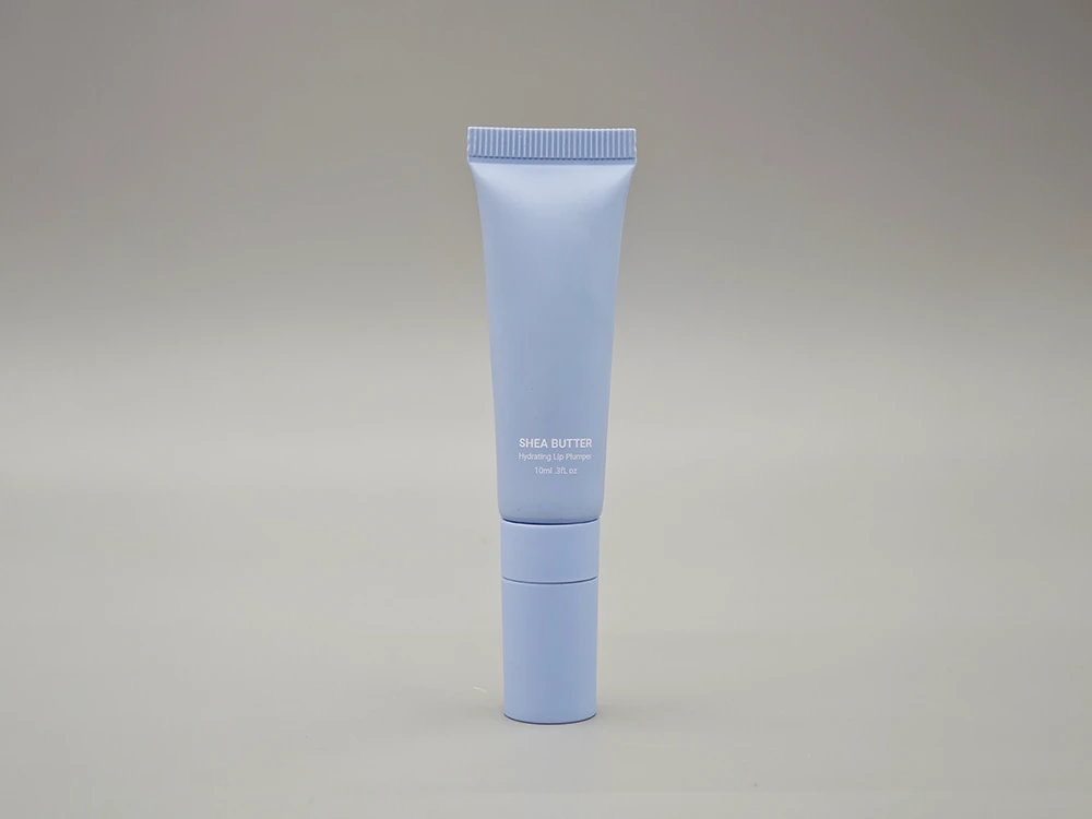 Tubo di lucidalabbra con applicatore a silicone morbido corpo blu opaco e cappuccio abbinamento 10 ml 1