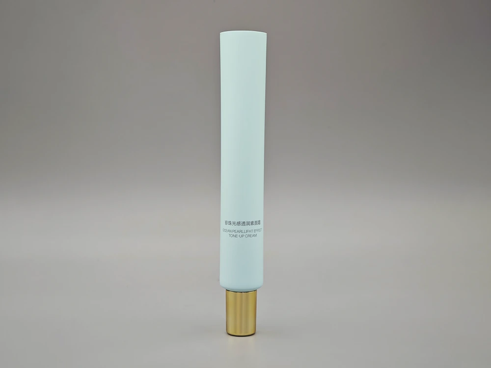 Gesichtscreme -Rohr mit Präzisionsdüsespitze mattblau PE -Körper und Goldkappe 20 ml 1