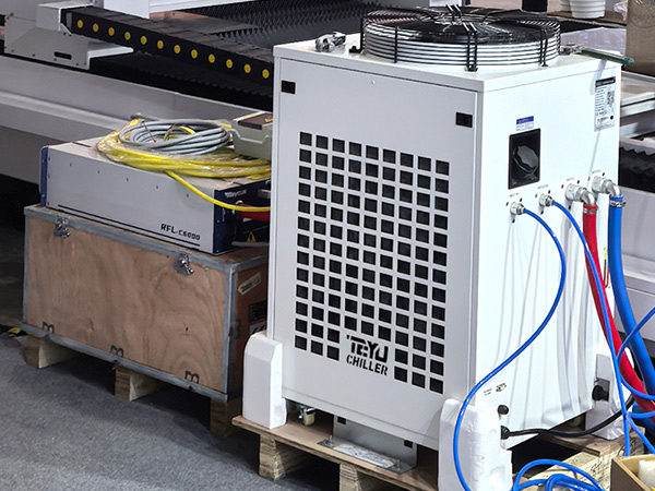 TEYU CWFL-6000 laser chiller for 6kW fiber laser cutting machines equipped with the RFL-C6000 laser source