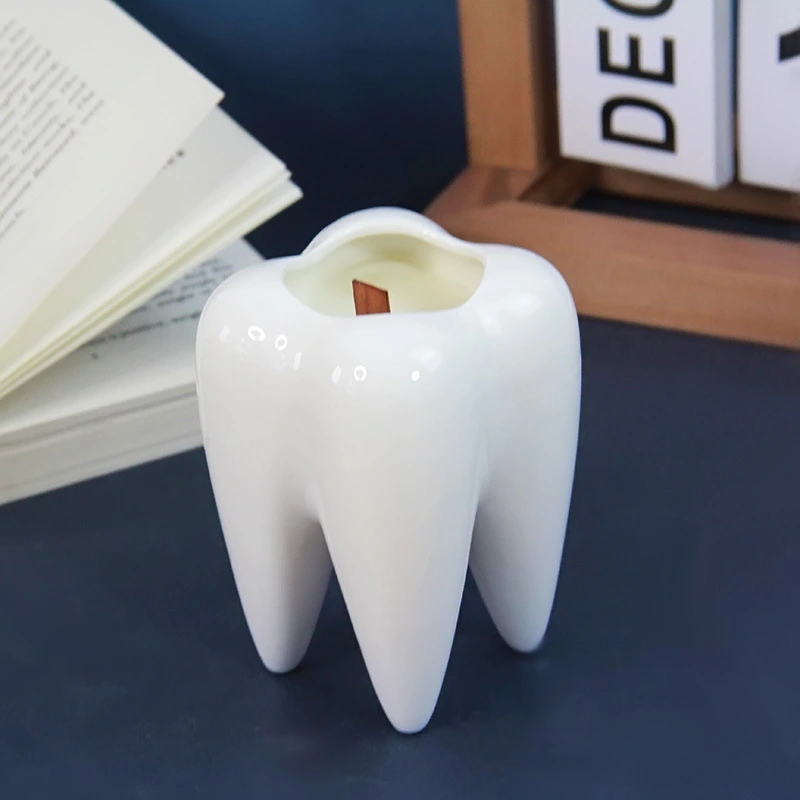 Barattolo di ceramica a forma di dente 1
