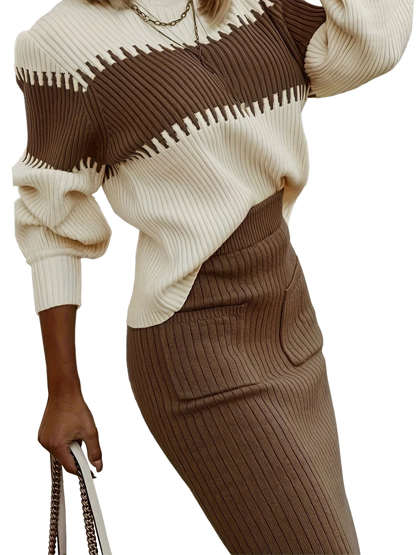 Fan Flo women's knitwear set with contrasting color blocking, 3D visible ribbed texture, and a European and American style. Features a knit sweater and skirt. 1