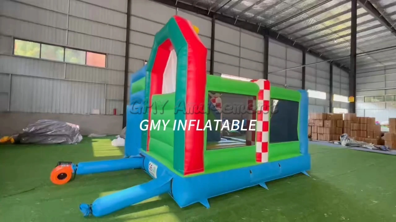 Commercial PVC Football Boy Football-themed Bounce House With Slide GMY Inflatables 1