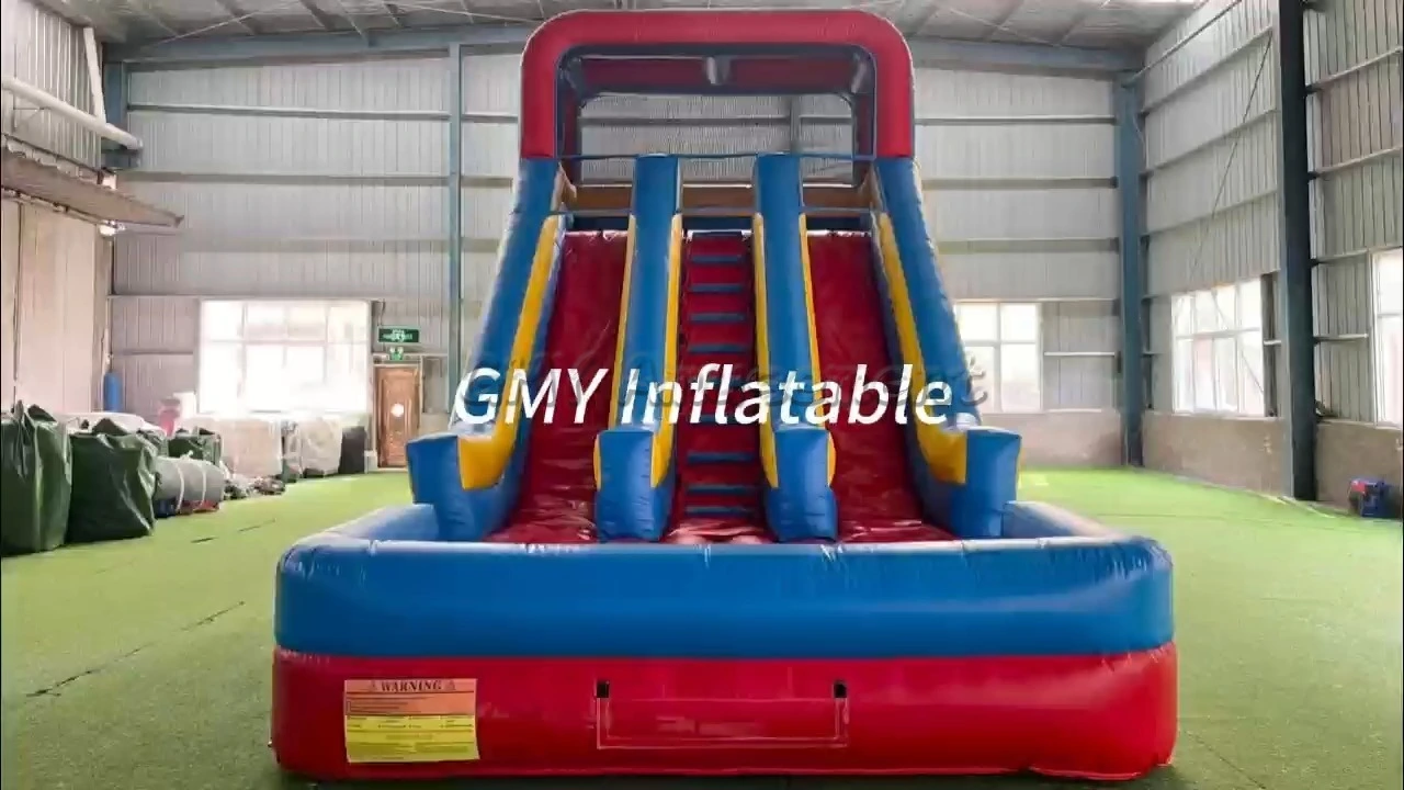 Château gonflable pour enfants avec toboggan sec rouge et bleu, jeux gonflables GMY Inflatables 1